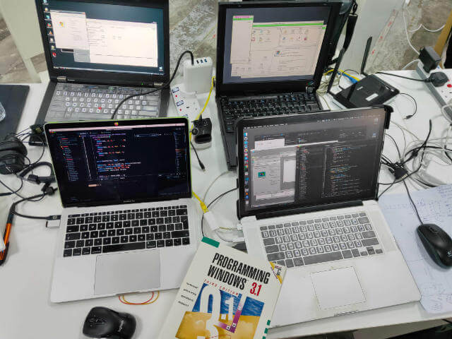 4 PCs, a router and a book