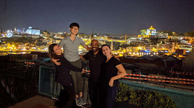 Group photo overlooking the city after dinner