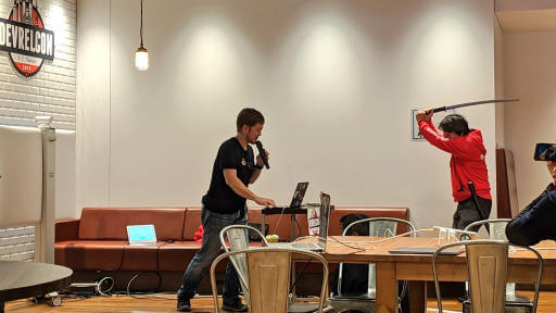 Speaker getting samurai-ed off the stage when time was up